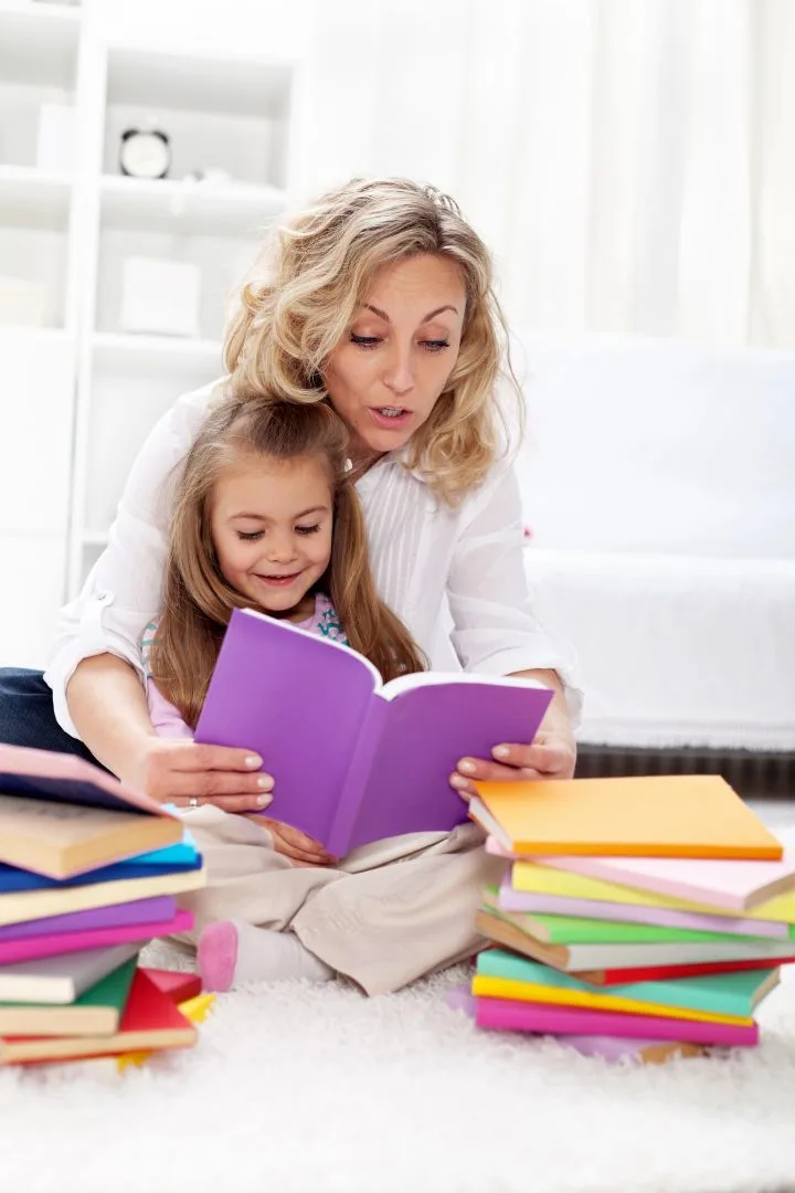 Depositphotos_7941450_L_resized A mom helping her daughter read